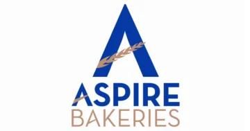 Aspire Bakeries logo featuring a blue triangle with wheat grain graphic, representing commercial bakery food manufacturing and wholesale distribution services.