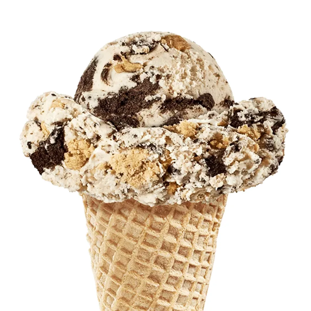 Three generous scoops of cookies and cream ice cream on a waffle cone, ideal for foodservice and wholesale distribution.