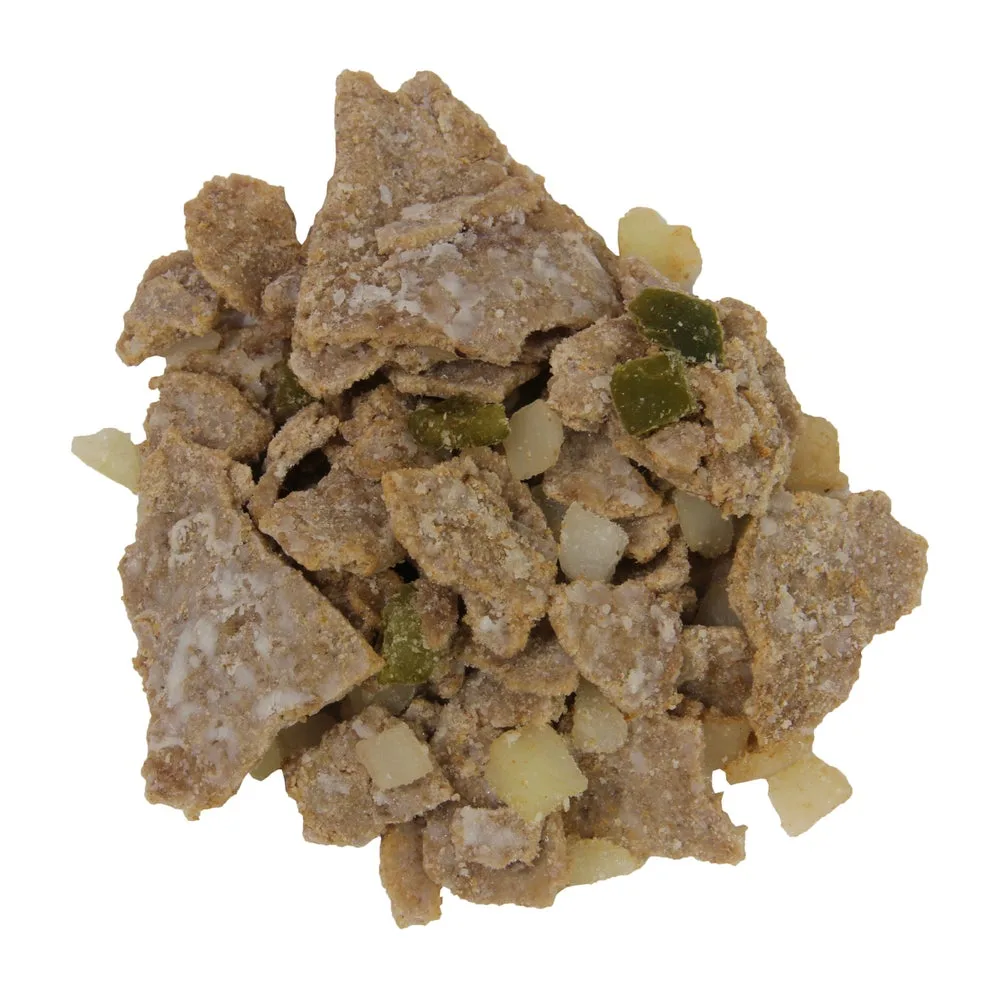 Close-up of diced mixed vegetables including green peas, white diced potatoes, and legumes in bulk foodservice portion.