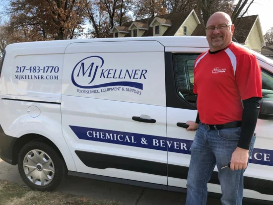 MJ Kellner foodservice equipment and supplies delivery van with professional representative in branded apparel.