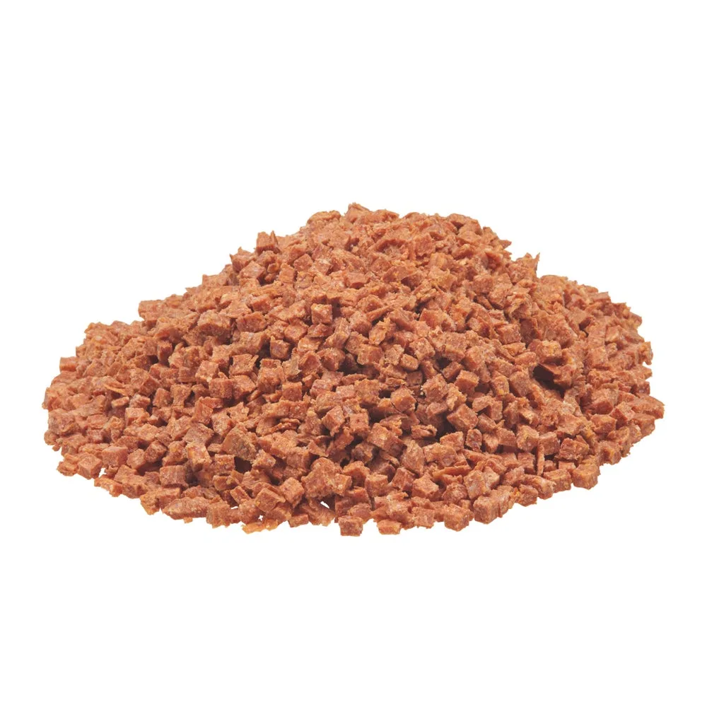 Bulk textured meat crumbles ideal for food manufacturers, distributors, and foodservice suppliers in commercial food production.